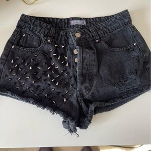 Pistola black studded cut off shorts.